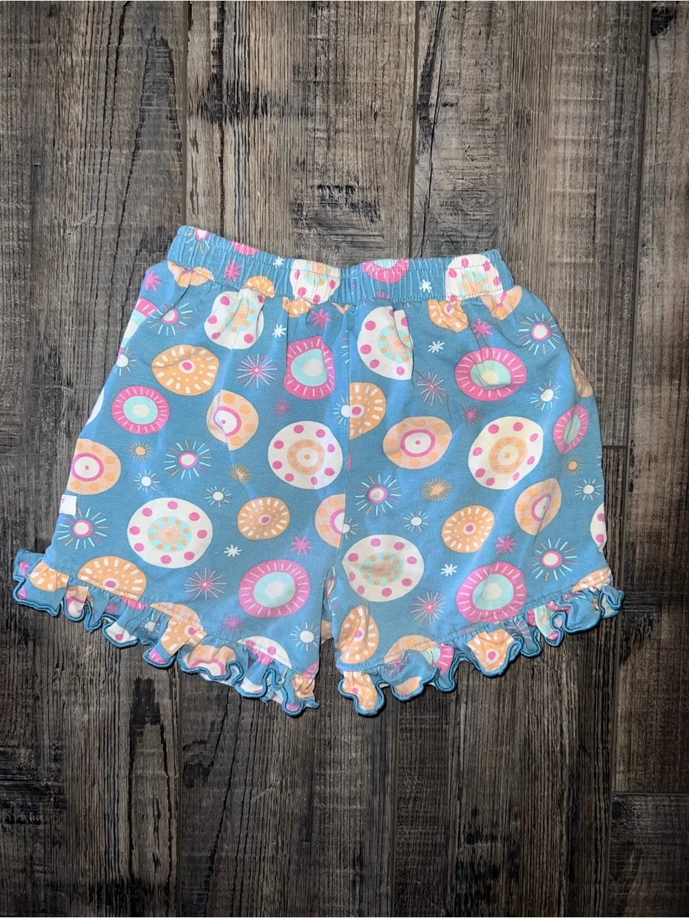Ruffle Butts Ruffle Hem Kids Shorts with Pastel Donut Print